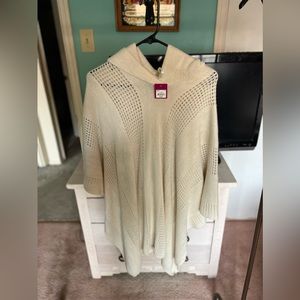 One size fits all thick cream colored cover up shawl